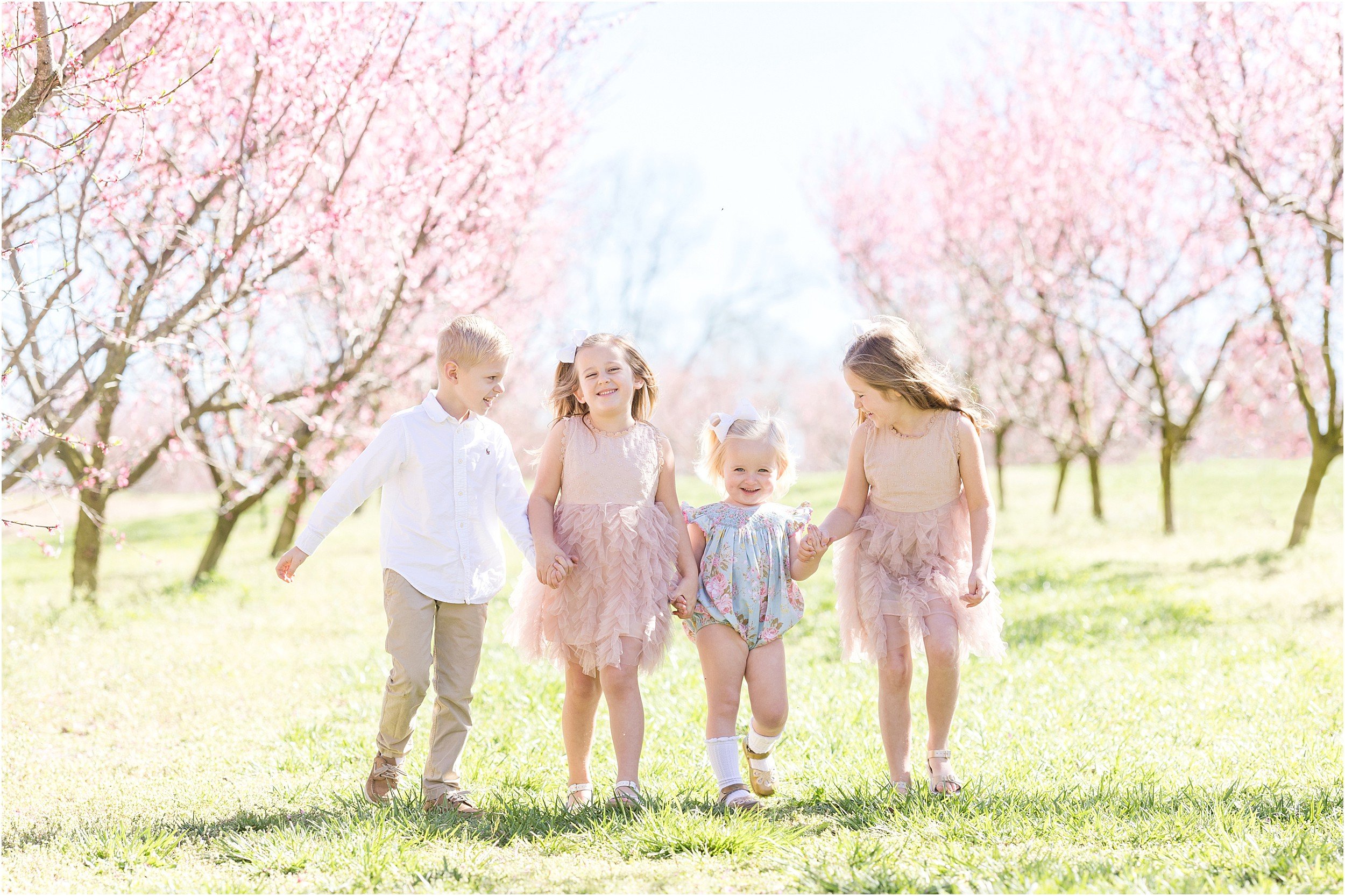 Wunderink Family Spring 2023-93_Millstone-Orchard-peach-blossoms-Raleigh-family-photographer.jpg