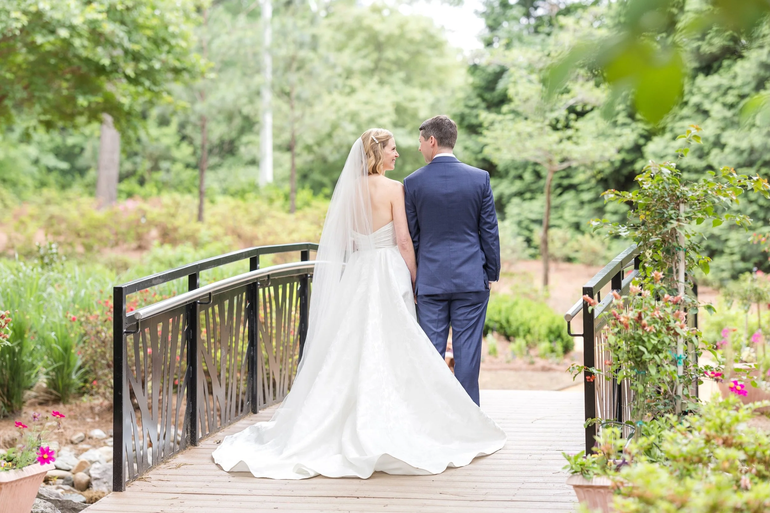 John and Katherine met while they were in business school together at Duke University and now they are married! They had a tearful first look at the WRAL Azalea gardens before their beautiful ceremony at @bridgeclubnc 💗

There were so many sweet mom