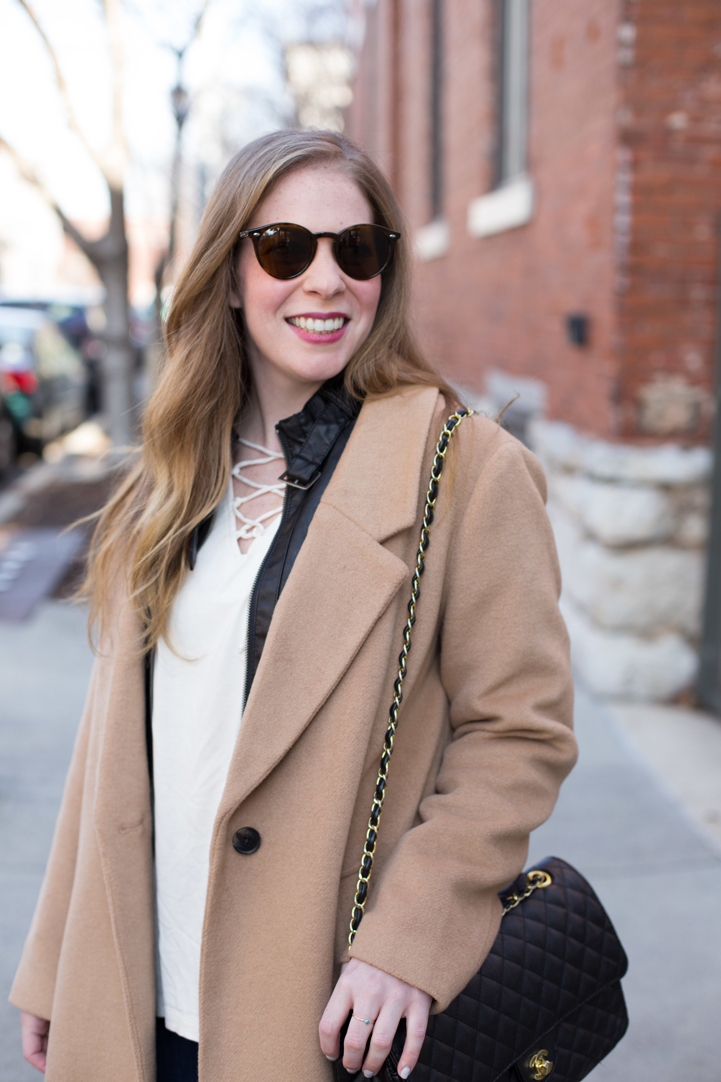 I can't get enough winter weather layering basics, like this leather jacket, overcoat in the perfect shade of camel, and simple blouse with lace-up detail. 
