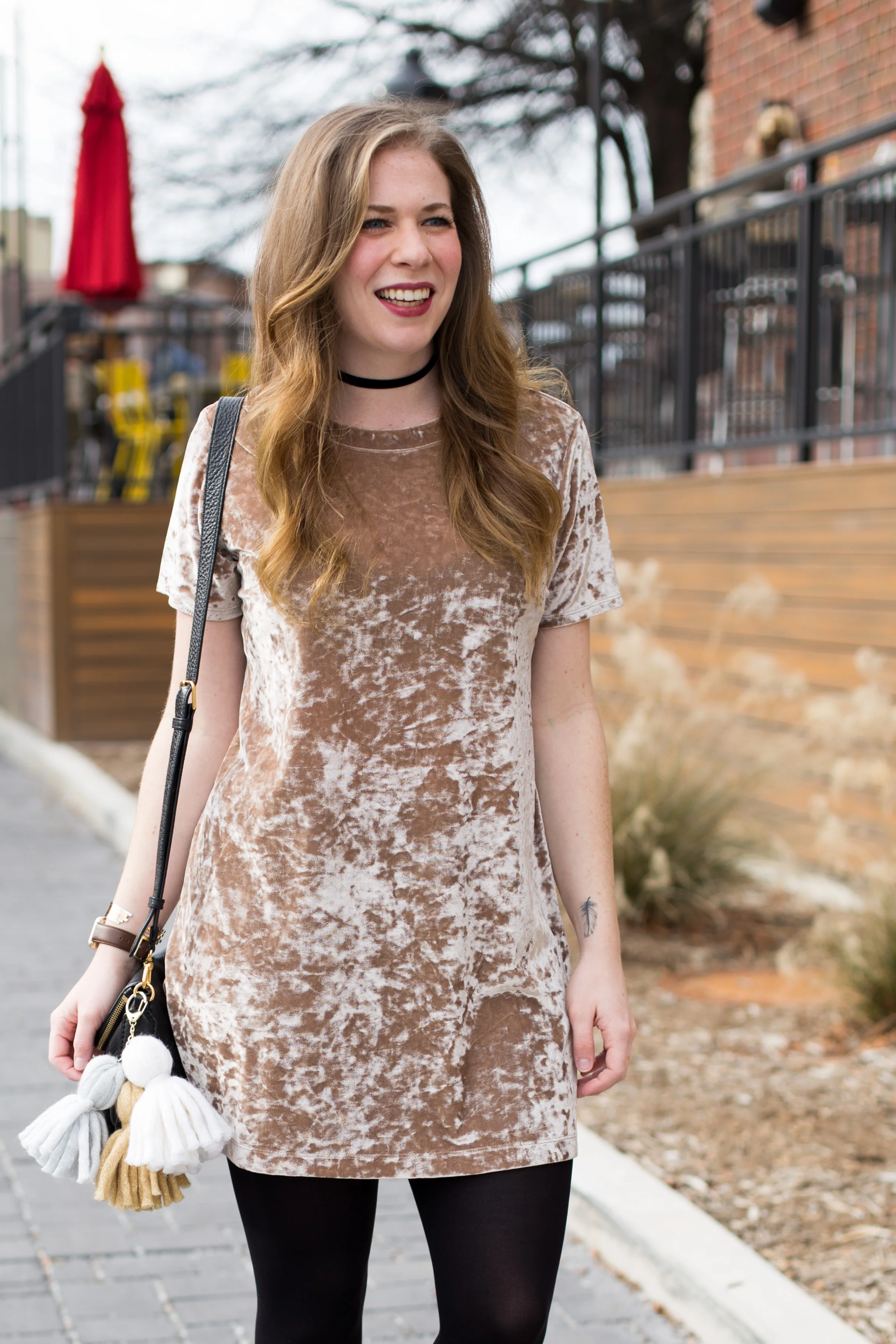 My favorite velvet shirt dress styled with black tights and funky boots + a handmade tassel DIY perfect for adding flare to your favorite handbag! 