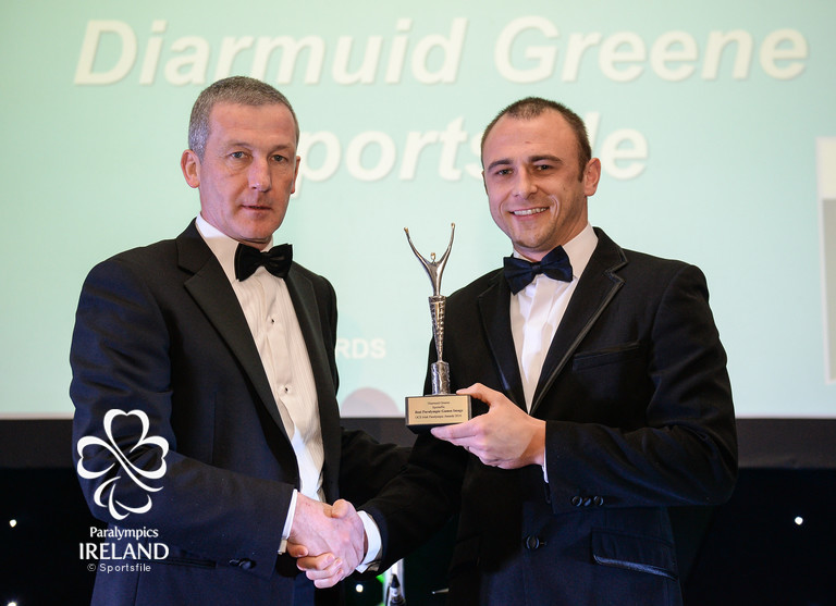   Diarmuid Greene, right, of Sportsfile, accepts the prize for Best Paralympic Games Image, from Cecil Ryan, OCS Europe, at the OCS Irish Paralympic Awards  