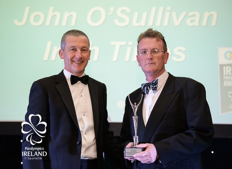   John O'Sullivan, right, of Irish Times, accepts the prize for Best Paralympic Games Written Coverage, from Cecil Ryan, OCS Europe, at the OCS Irish Paralympic Awards  