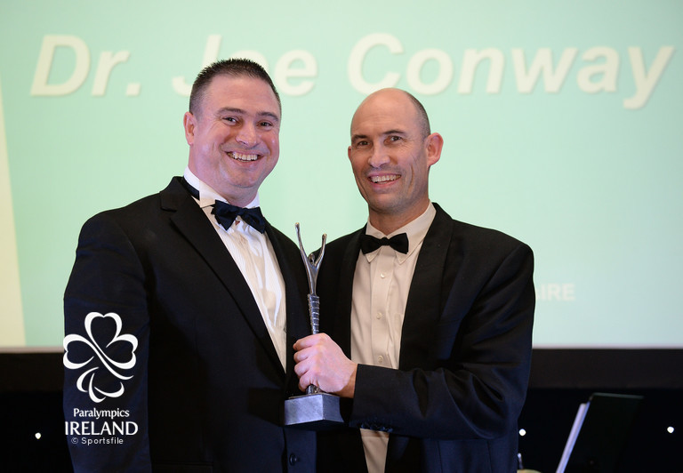   &nbsp;Dr. Joe Conway accepts the prize for Outstanding Team Member (Non Athlete), from Dave Malone, Irish Paralympic Performance Director, at the OCS Irish Paralympic Awards  