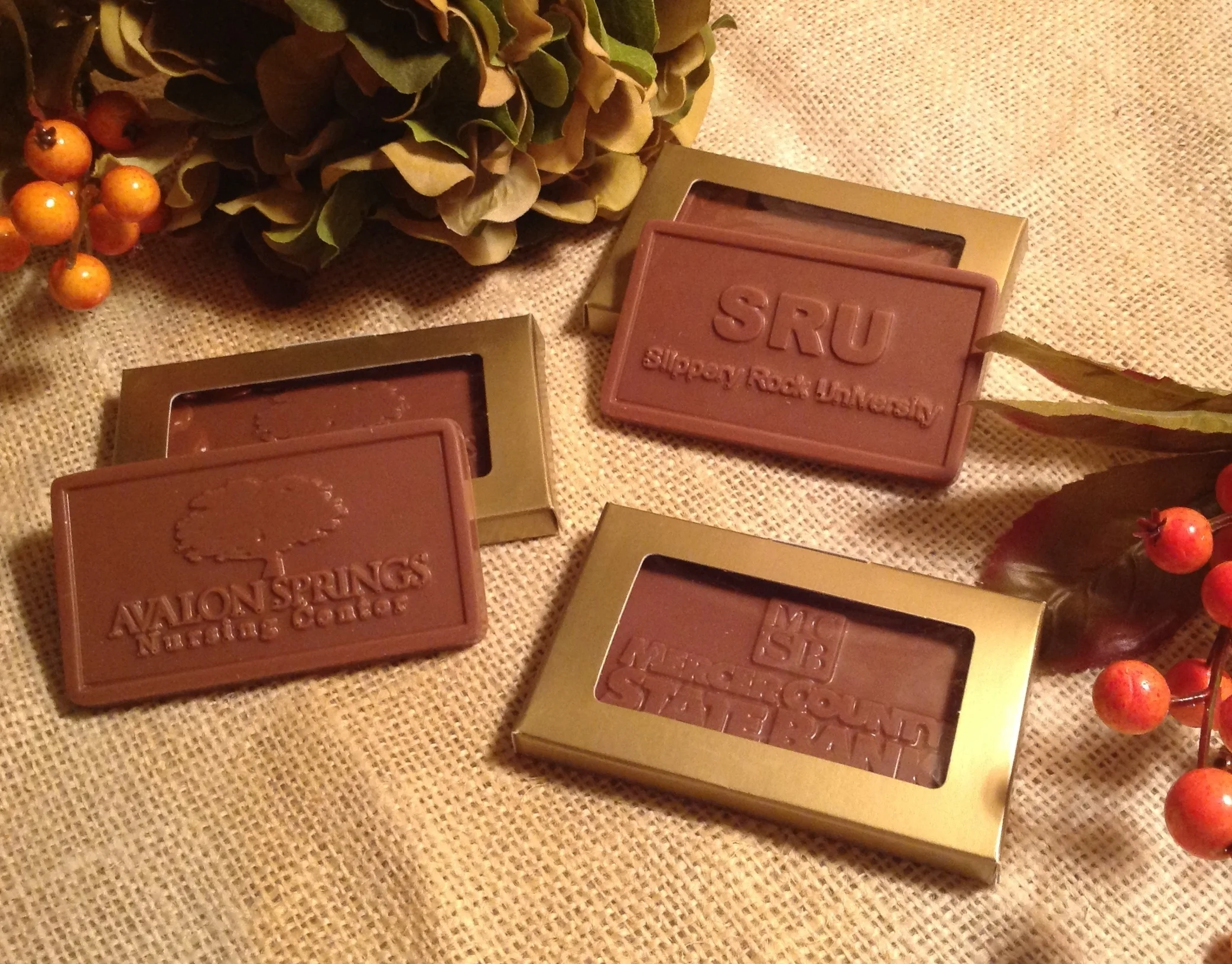 1 oz. solid chocolate card with your business name or logo.