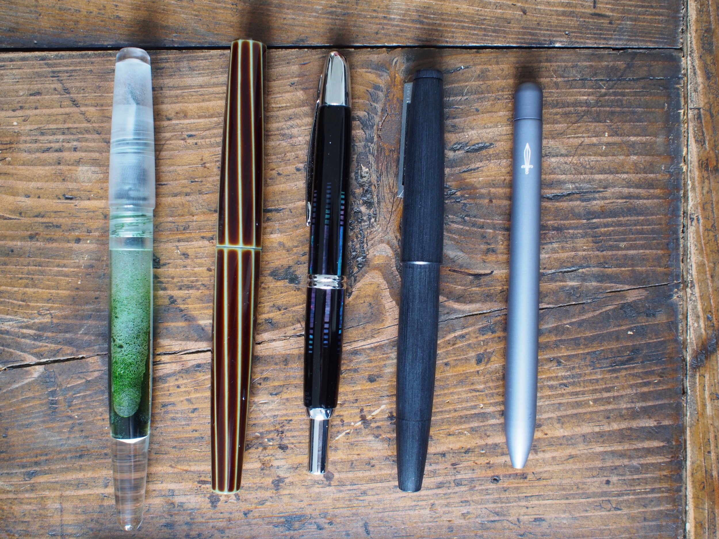 L-R:Franklin-Christoph 66, Nakaya Decapod Twist, Pilot Vanishing Point, Lamy 2000, Baron Fig Squire