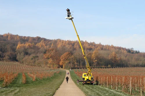 Laurie King was good enough to send me this photograph of me out working on the Cherry Picker project a couple of weeks ago.
I’m slowly coming to the conclusion that maybe all photo shoots should involve a self-drive crane. They’re certainly proving to be more fun than the average shoot…
As always the cherry picker was provided by the brilliant people at Facelift .