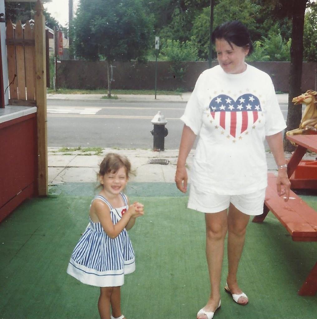 My grandma and I at my aunt's ice cream shoppe in City Island, 4th of July, 1990