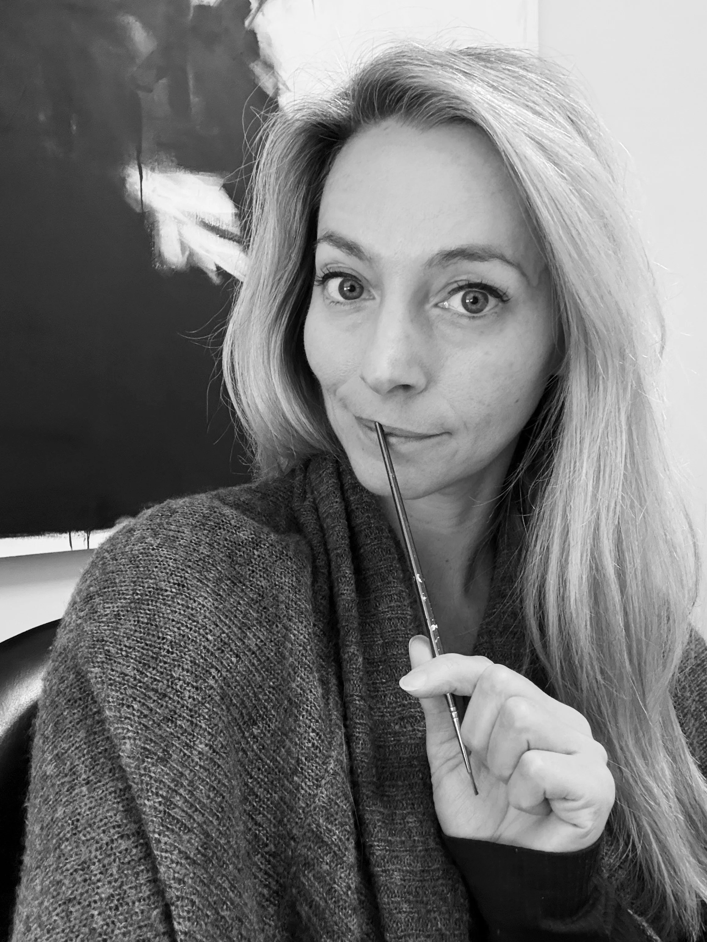 Portrait of artist Carolyn Nikolai photographed in studio.