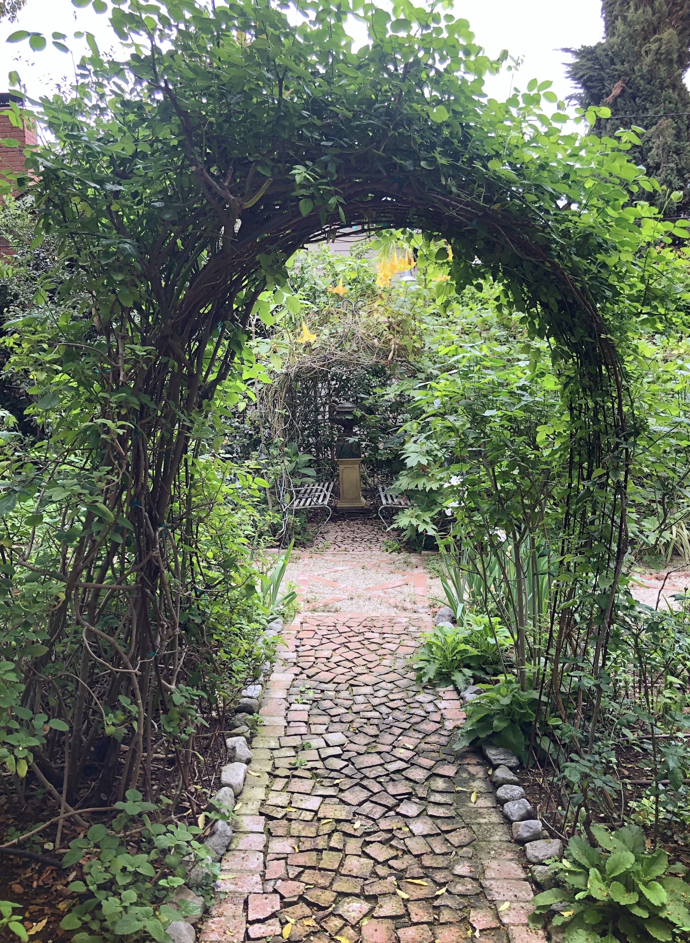 Kate and Odom Stamps’ lush garden is full of paths leading to beautiful surprises.