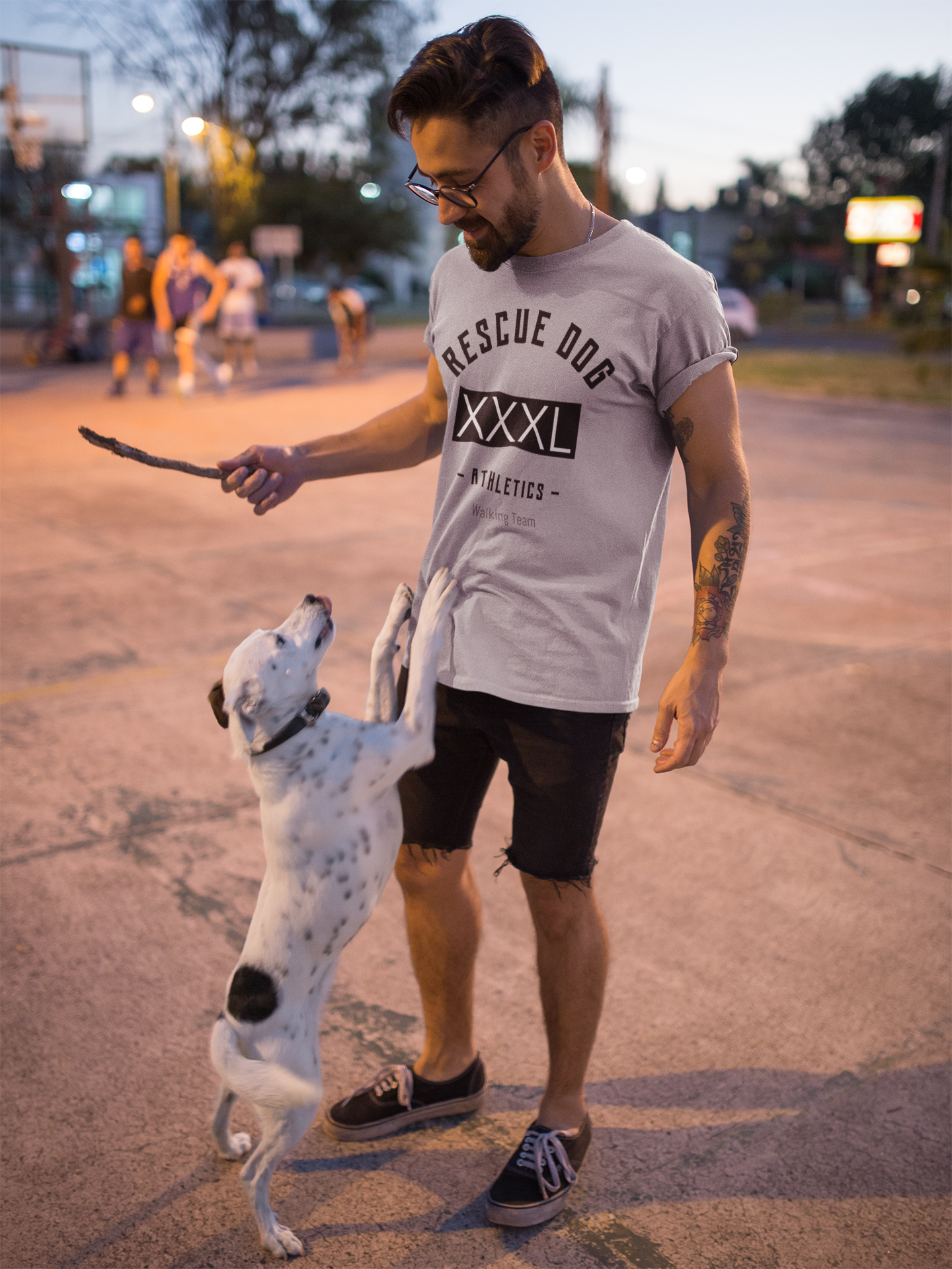 t-shirt-mockup-of-an-edgy-man-playing-with-his-dog-18030.png