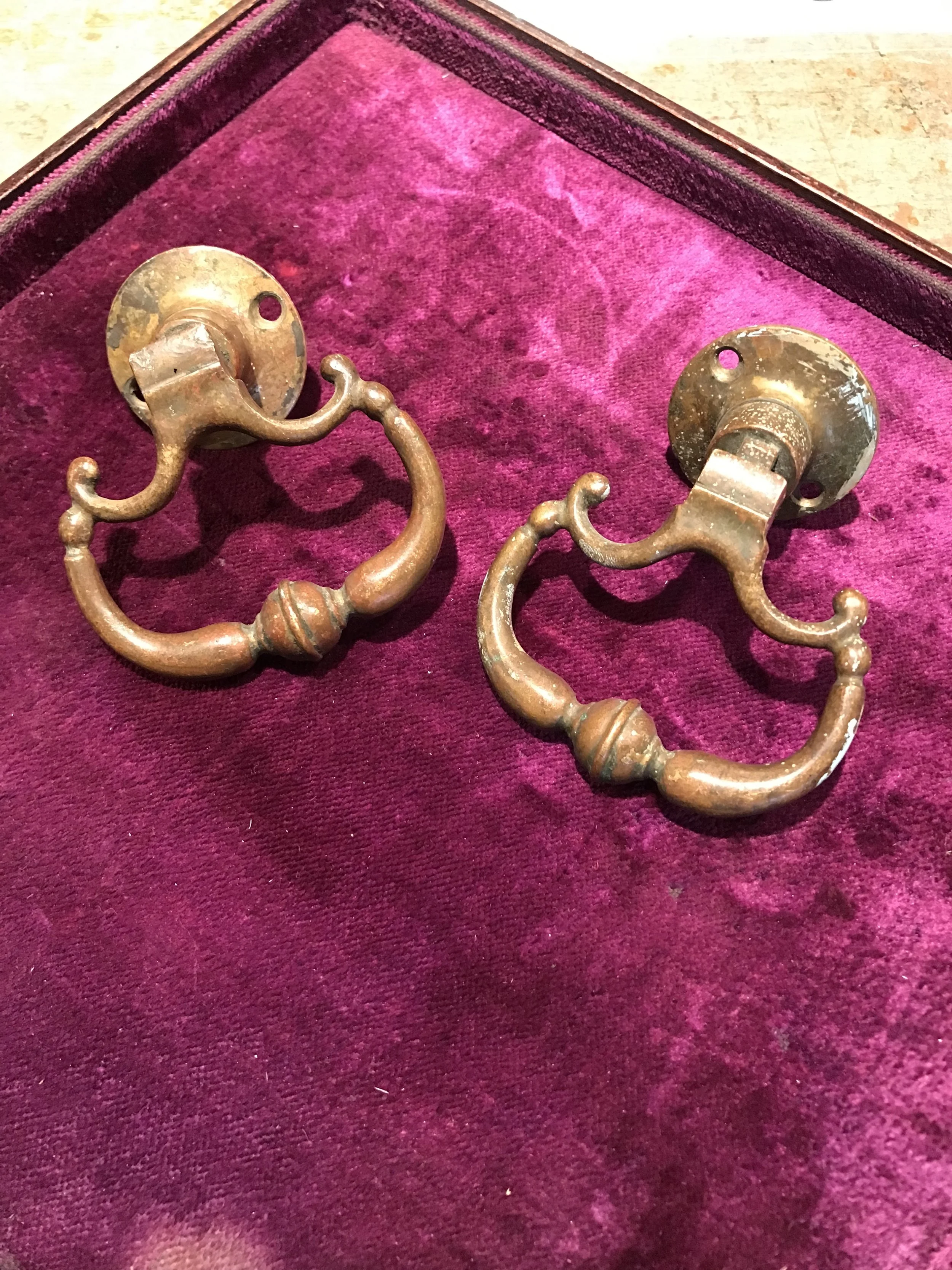 Sand cast brass door handles.