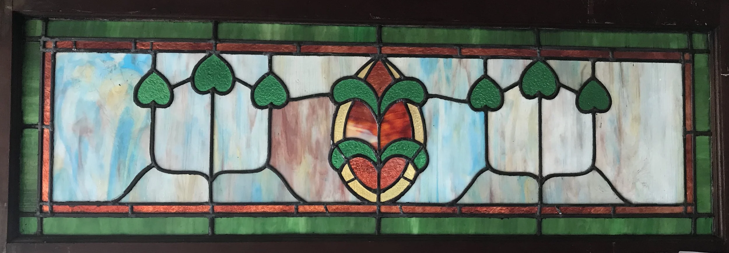 Antique slag glass transom window