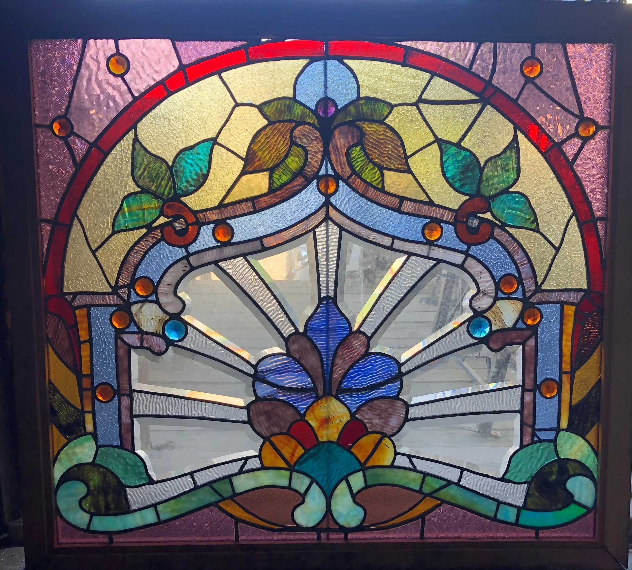 Antique stained and beveled glass window