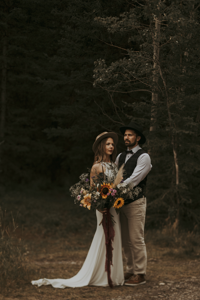 Beautiful Amazing Wedding Photo of Bride and Groom in Forest in Banff, Alberta, Canada