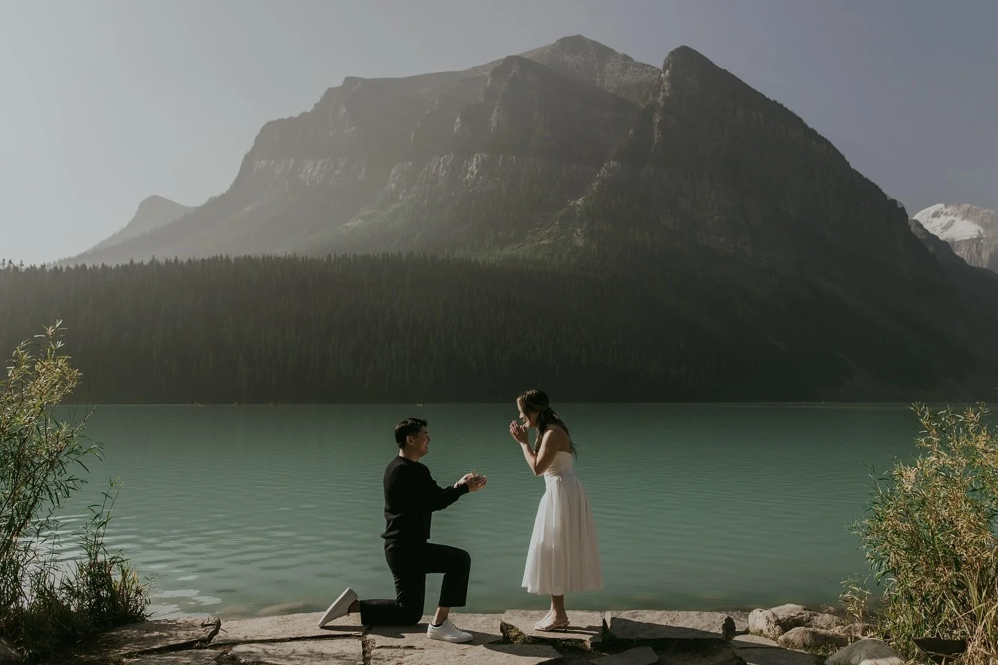 This sunrise proposal at the iconic Lake Louise was nothing short of a page out of a storybook.❤️ Such a beautiful morning with the dreamiest light. 

#lakelouisecanada  #lakelouise #banffproposal #banffproposalphotographer  #banffphotographer #lakel