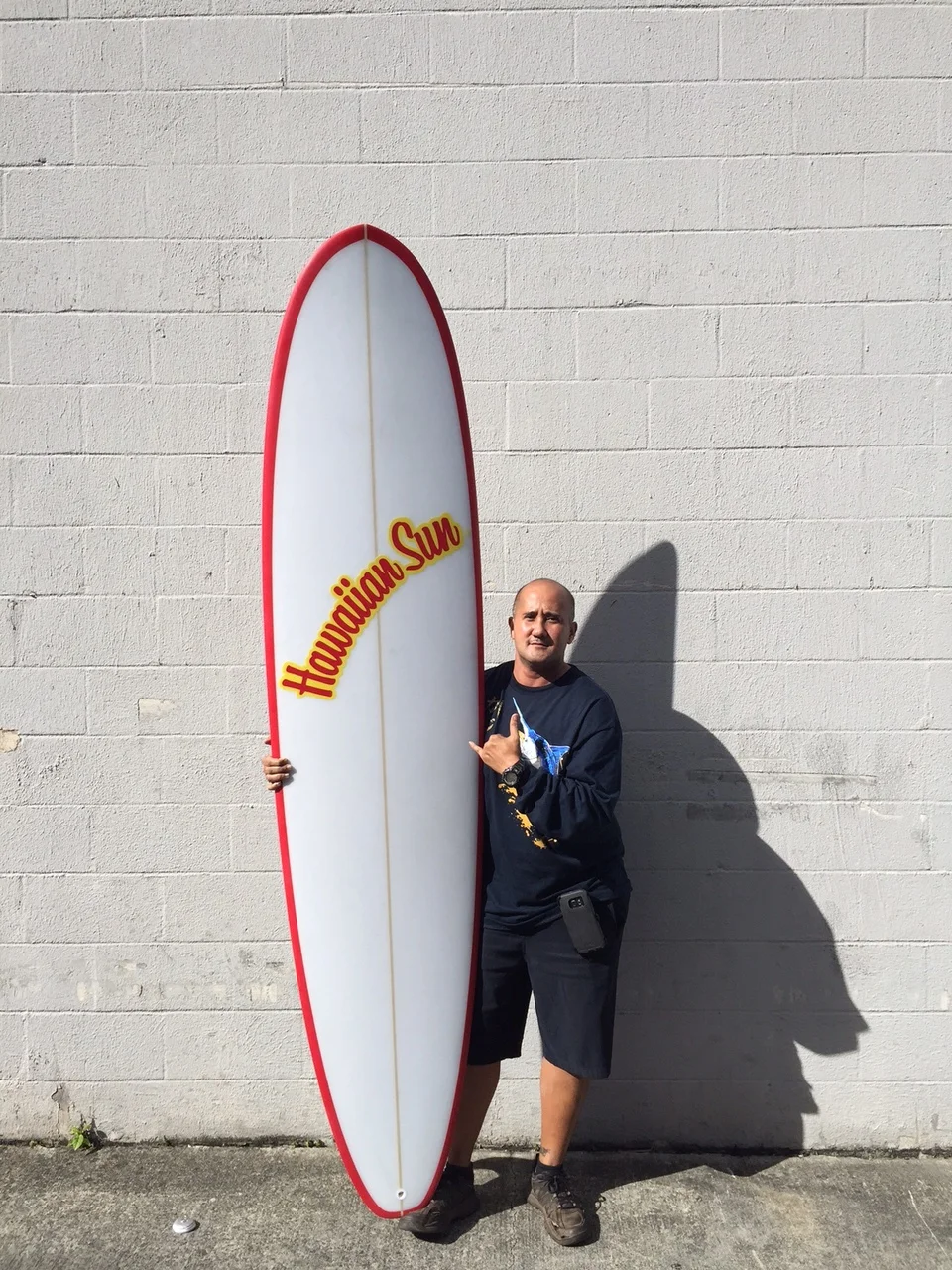Joe Ng, winner of the Hawaiian Sun surfboard