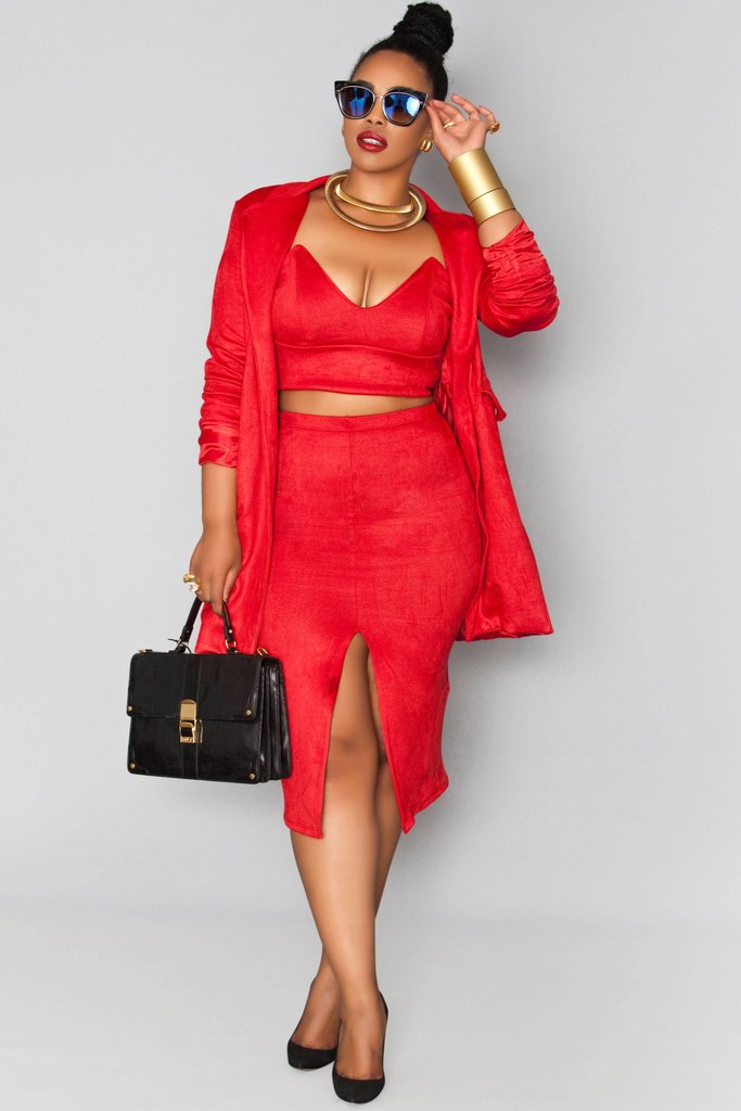 I am here for this look all day! The split in the skirt shows a little leg, but still leaves a little to the imagination. The crop top and jacket put this look over the edge. #SLAY