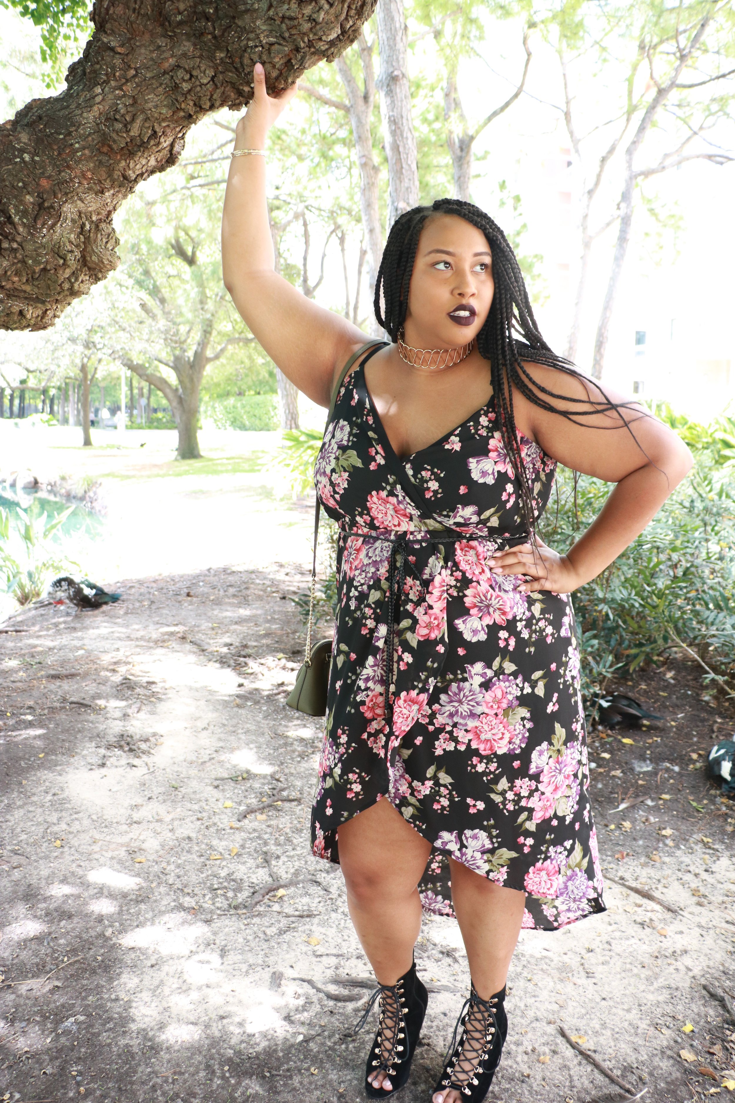 Meet Baraka, and watch her slay in this floral print and lace up bootie combo. #90'sgoals