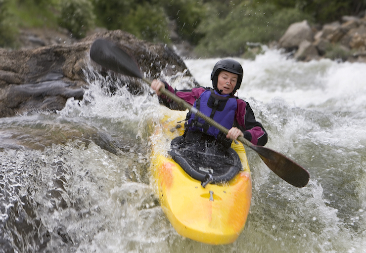 A kayaker in a whitewater competition ©iStock
