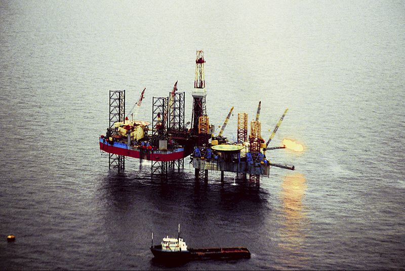 Oil and natural gas are reached in places under the oceans using drills from oil rigs like this