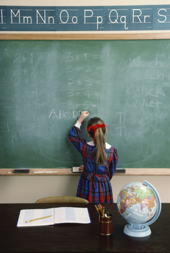 Learning to write our modern alphabet ©Getty Images