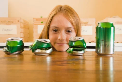 Recycling cans is good for the environment. Getty Image