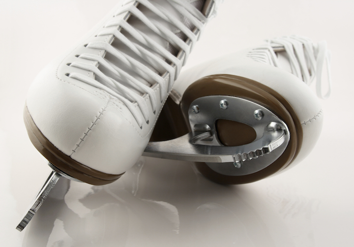 Ice skates are blades attached to firm boots. ©Getty