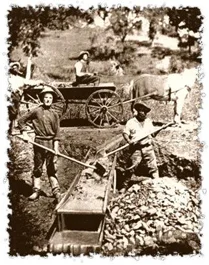 Sluicing to separate gold from the rocks. ©Getty Images