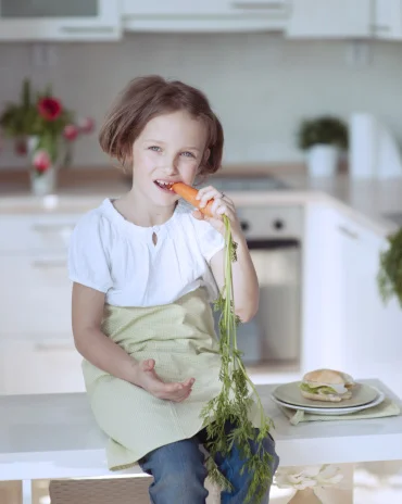Eating carrots is good for your hair. Getty Images