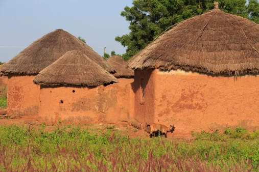 Mud and straw are also used to build huts like this in Ghana, Africa. Getty Images