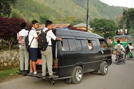 These students take buses (riding on top!) and mini taxis to school