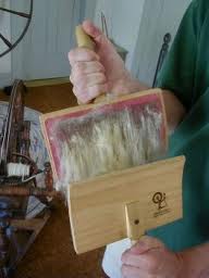 Carding the fleece ©Getty Images