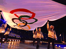 The Olympic flag is carried into the arena during the opening ceremony.