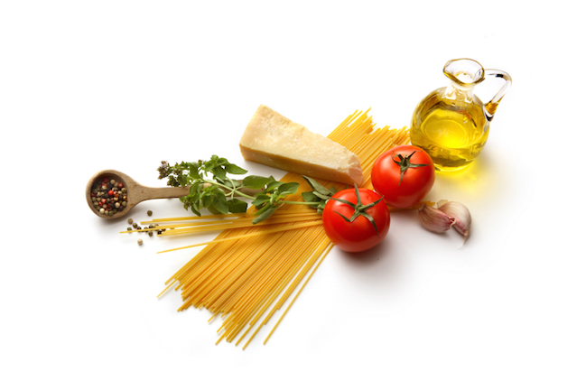 Essential ingredients of Italian food: pasta, tomatoes, garlic, olive oil and Parmesan or similar sharp cheese. ©Getty