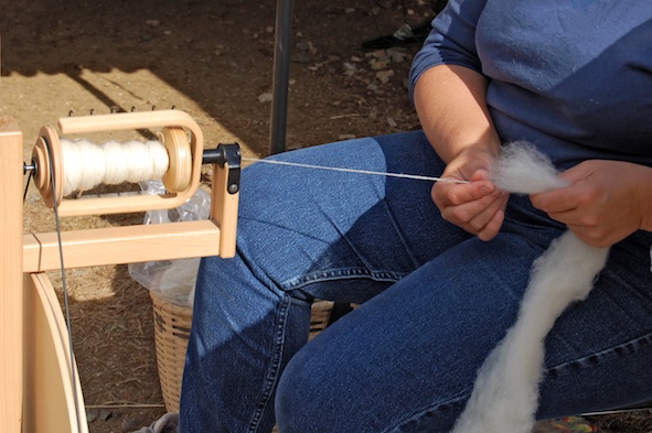 Spinning wool into yarn ©Getty Images