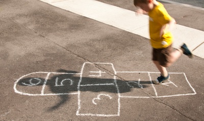 Playing hopscotch in the school ground ©Getty Images