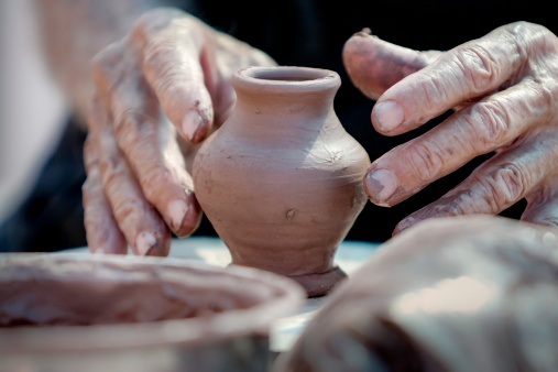Because clay particles bond together tightly, it is good for making pottery. Getty Images