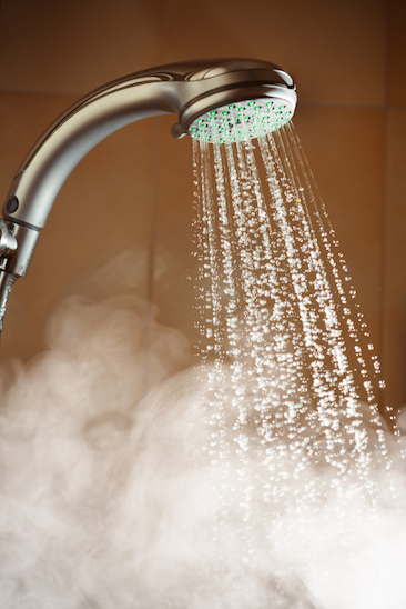 Test the temperature of the water before getting into the bath or shower © Getty images