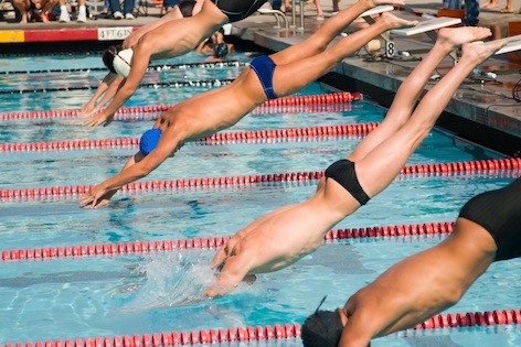 A dive into the pool starts the race