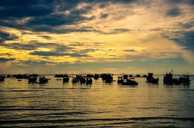Vietnamese fishing boats at dawn. Photo©iStock