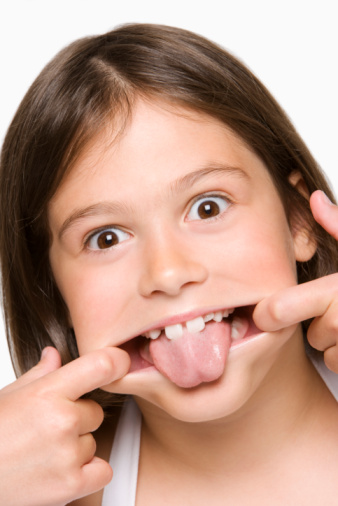 The average tongue is about 10 centimetres long. But you can only see a part of it. Getty Images