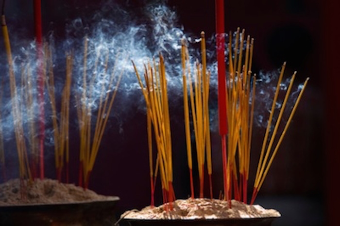 Incense sticks welcome the ancestors during Tet. Image © iStock