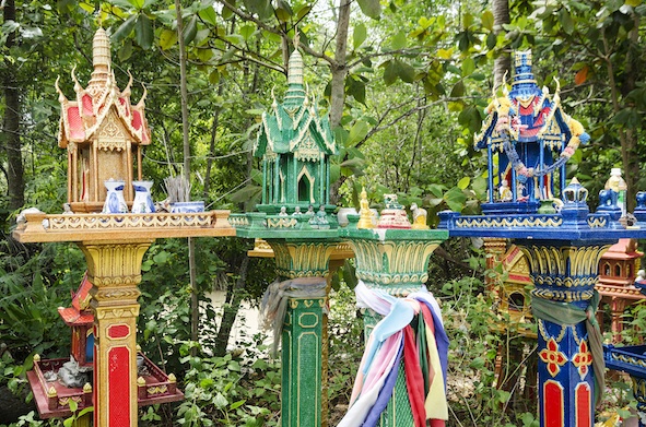 Buildings in Thailand each have a spirit house to pay respects to the spirit of that property. ©Getty