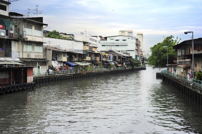 Crowded housing along a Bangkok klong. Photos.com