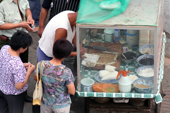 A street food stall. Photos.com