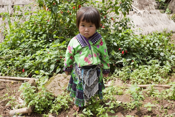 A Meo child in traditional clothing. Photos.com