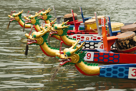 Dragon boats can be 30 metres long and have 80 rowers. © Getty Images