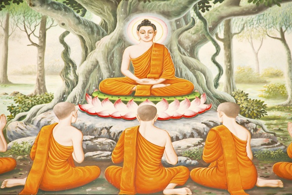 A painting of the Buddha seated under a bodhi tree to teach his followers. Getty Images