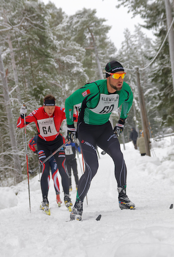 Cross-country skiers in a forest. © istock/Getty Images
