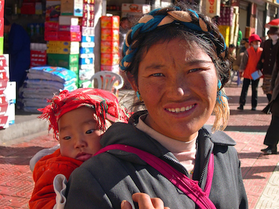 In Tibet, babies are often carried on their mother's back in a special sling.